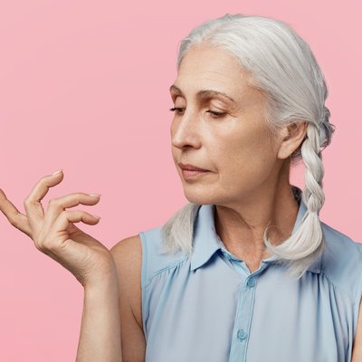 elderly-woman-with-pigtails-posing