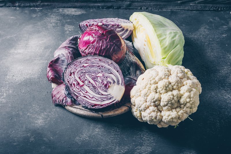 high-angle-view-red-cabbage-black-textured-background-horizontal